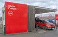 Cars parked  outside a Tesco supermarket click and collect area. Brooklands   Surrey. Royalty Free Stock Photo