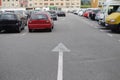 Cars parked in a row on a city street Royalty Free Stock Photo