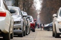 Cars parked in a row on a city street side Royalty Free Stock Photo