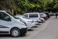 Cars in the parking lot along the street Royalty Free Stock Photo