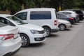 Cars in the parking lot along the street Royalty Free Stock Photo