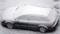 Cars in the parking lot covered in sticky snow