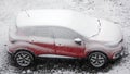 Cars in the parking lot covered in sticky snow