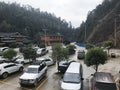 Cars on parking lot near gate of Dazhai Longsheng Royalty Free Stock Photo