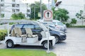 Cars on a parking lot and parking sign