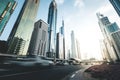 Cars passing on highway in front of skyscrapers Dubai - UAE Royalty Free Stock Photo