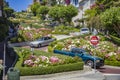 Cars passing the Lombard street in San Francisco. It is  known for the  section on Russian Hill between Hyde and Leavenworth, in Royalty Free Stock Photo