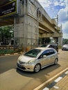 Cars passing through street of Jakarta