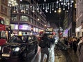 Cars and people in night traffic jam on the streets of London during December 2023 Royalty Free Stock Photo