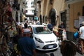 Cars and People Pack a Busy Street in Amalfi, Italy