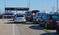 Cars and people waiting to board ferry to island Texel