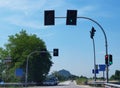 Cars queuing in line waiting at traffic light