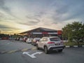 Cars queuing at McDonald\'s drive-thru