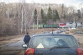 Cars queuing on a road before railway crossing