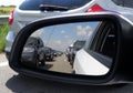 Cars reflections in side mirror of vehicle on the road Royalty Free Stock Photo