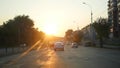 Cars rides on a motorway at sunset