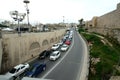 Cars on road between ancient & modern Jerusalem
