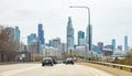 Cars on the road, Chicago high rise buildings and cloudy sky background. Illinois, USA Royalty Free Stock Photo