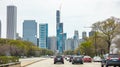 Cars on the road, Chicago high rise buildings and cloudy sky background. Illinois, USA Royalty Free Stock Photo