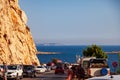 Cars on the road in the gorge to the Kaputas beach in Turkey. Road with cars near the beach with turquoise water Royalty Free Stock Photo