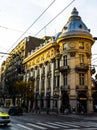 Cars on the road, old buildings on Regina Elisabeta Way in downtown Bucharest, Romania, 2019