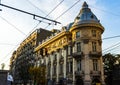 Cars on the road, old buildings on Regina Elisabeta Way in downtown Bucharest, Romania, 2019