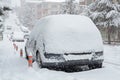 Cars and roads covered with snow