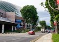 Cars running on street nearby Durian Theather in Singapore