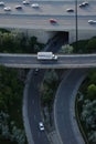 Cars rushing on the expressway in Toronto, aerial, vertical