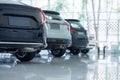 Cars For Sale. Automotive Industry. Cars Dealership Parking Lot. Rows of Brand New Vehicles Awaiting New Owners in the showroom Royalty Free Stock Photo