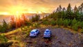 Cars standing in a quarry at dawn. Royalty Free Stock Photo