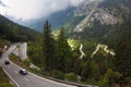 Cars on a steep mountain road turn