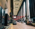 Cars stopping at lobby of luxury hotel