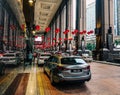 Cars stopping at lobby of luxury hotel