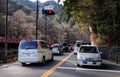 Cars stopping on main street in Nikko, Japan