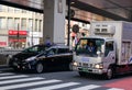 Cars stopping on street at Shinawa district in Tokyo, Japan