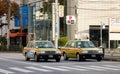 Cars stopping on street at Shinawa district in Tokyo, Japan