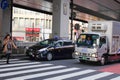 Cars stopping on street in Tokyo, Japan