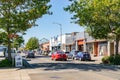 Cars on the street in downtown Astoria with Astoria Megler Bridge in the background Royalty Free Stock Photo