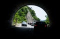 Cars on the street, in the road tunnel. Photo inside the road tunnel.