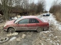 Cars stuck in a broken Russian road