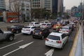 Cars stuck in traffic jam in the middle of the city