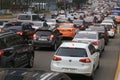 Cars stuck in traffic jam in the middle of the city