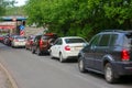 Cars stuck in traffic on a narrow one-way road