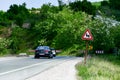 Cars  on a  Sunny mountain road Royalty Free Stock Photo