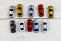 Cars toys on white wooden background. Top view Royalty Free Stock Photo