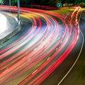 Cars traffic commute on highway at night Royalty Free Stock Photo