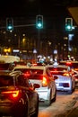 Cars in a traffic jam in the center of a big city at night Royalty Free Stock Photo