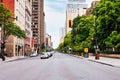 Cars, traffic lights and buildings on Sherbrooke street in Montreal, Quebec, Canada Royalty Free Stock Photo