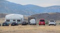 Cars, trailers, tents on vacation in the mountains Royalty Free Stock Photo